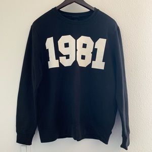 MEN’S 1981 SWEATER.